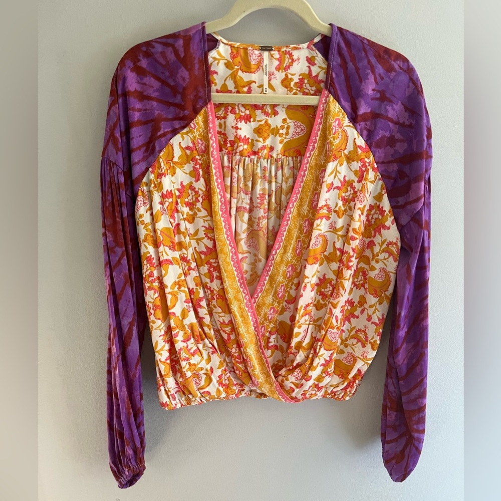 Free People mixed print wrap top size medium